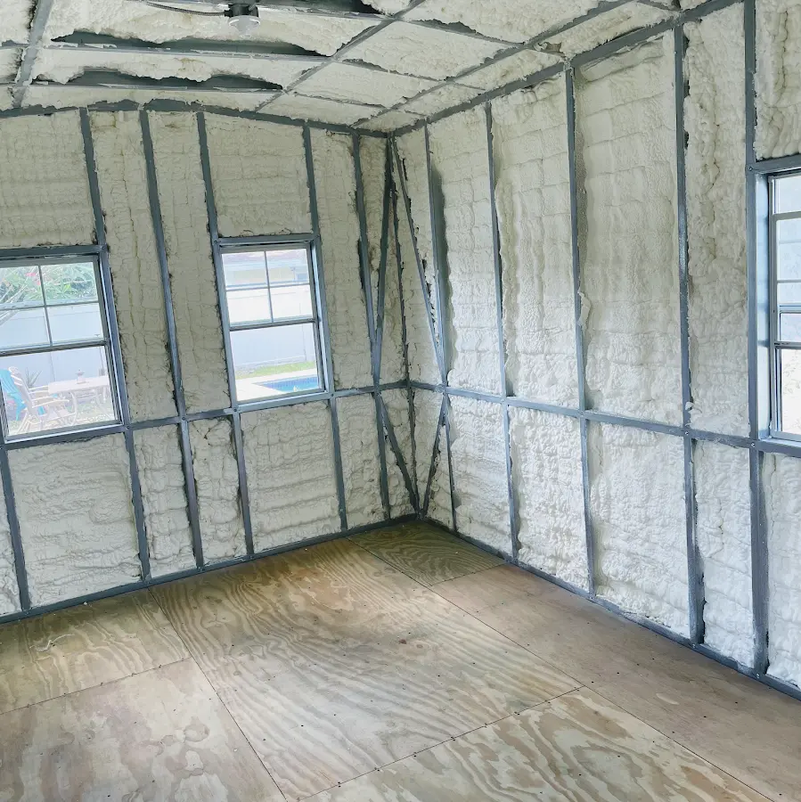 Closed-cell spray foam insulation applied to wall cavities in a residential project in Winters